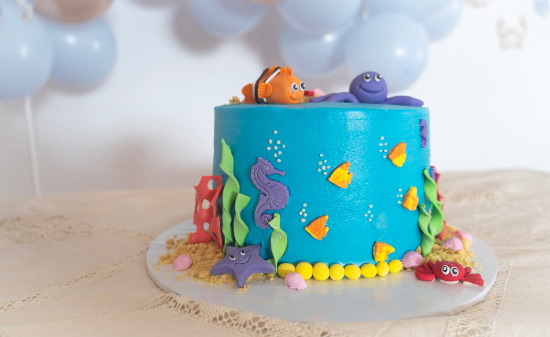 Ocean themed cake with nemo and octopus decorations