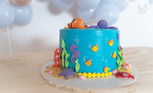 Ocean themed cake with nemo and octopus decorations