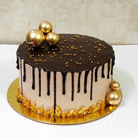 Chocolate Drip Cake with Golden Accents